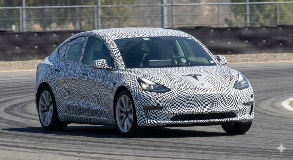 Camouflaged Tesla Model 2 2026 hatchback prototype spy shot