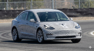 Camouflaged Tesla Model 2 2026 hatchback prototype spy shot