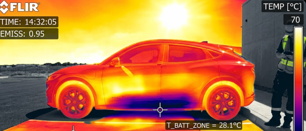3D transparent cutaway of an EV lithium-ion battery pack showing liquid cooling tubes.